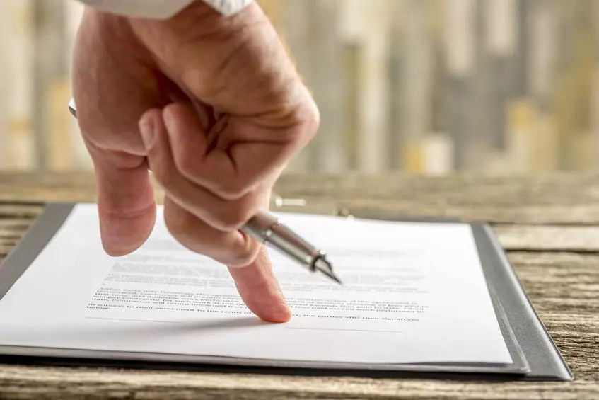 Family meeting with legal advisor, showing when a Will is crucial—highlighting Trusted Will Writing Tewkesbury for essential life planning.